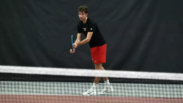Alexis Maulouet prepares to serve vs. NKU