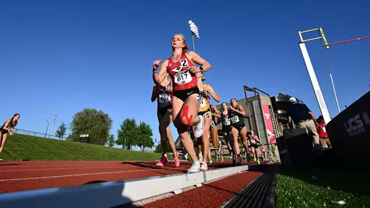 McKinley Fielding runs at the 2025 HL Outdoor Championships (Wide angle photo)