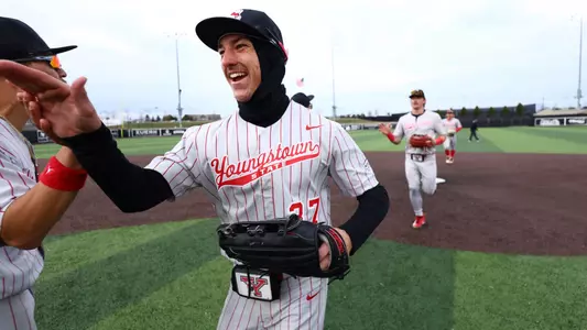Nathan Beckley celebrates with teammates for YSU after winning a baseball game at Milwaukee on April 3, 2026 (Photo by Bryson Chavez)