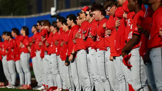 YSU baseball players stand for the National Anthem prior to a game at Pitt on April 8, 2026 (Photo by Bryson Chavez)