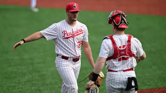 Braden Gebhardt greets a teammate walking off the mound during a YSU baseball game vs. Milwaukee on May 8, 2026 (Photo by Dave Dermer)