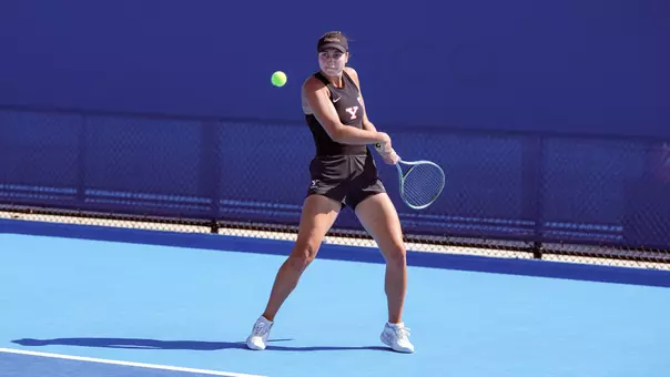 Yeseniia Ovcharova returns a backhand shot
