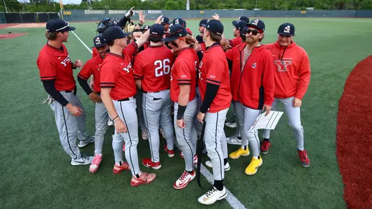 YSU baseball players huddle together following a victory at Wright State on May 15, 2026 (Photo by Bryson Chavez)