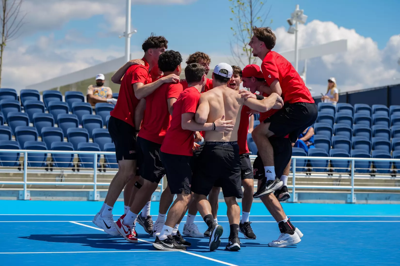 Men's Tennis - Semifinal Victory Celebration