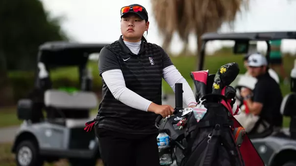 Neeranuch Prajunpanich walks to a tee box for YSU during the 2026 Horizon League Women's Golf Championship (Photo by Drae Smith)