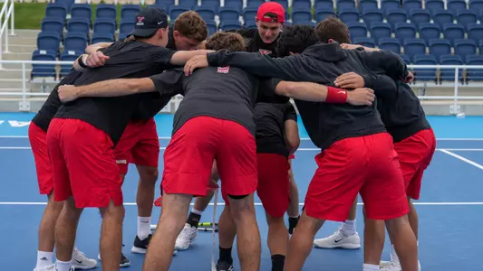 YSU Men's Tennis huddles prior to the Horizon League Championships
