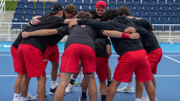 YSU Men's Tennis huddles prior to the Horizon League Championships
