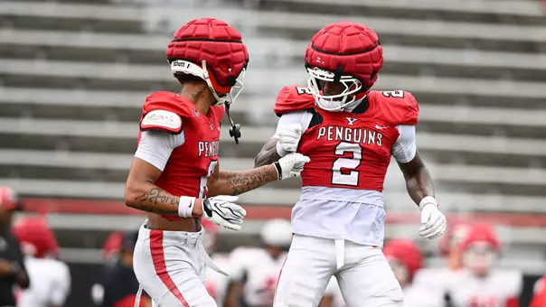Jeremiah Sanders and Dorian Williams celebrate during YSU's football scrimmage on April 15