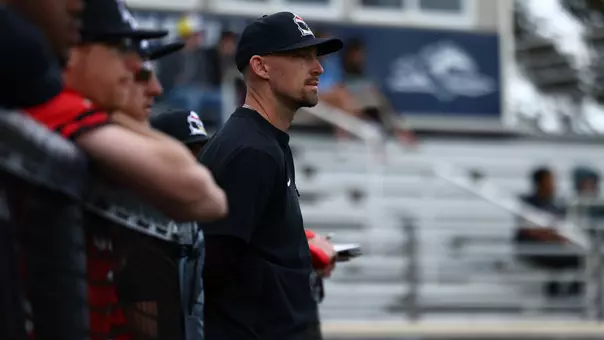 YSU Head Baseball Coach Trevor Charpie watches during a game at Longwood on March 1, 2026 (Photo by Bryson Chavez)
