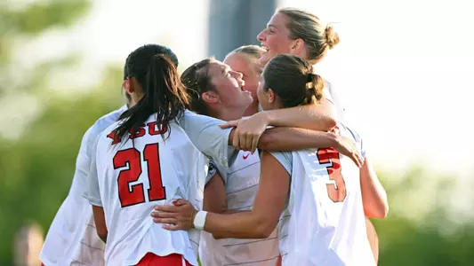 Autumn Fairfax and teammates celebrate her game-tying goal against Kent State