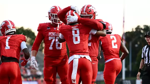Bryan Hunt celebrates with teammates in the end zone after scoring a touchdown against Mercyhurst on Aug. 27, 2026.