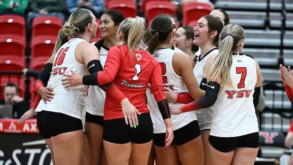 The YSU volleyball team celebrates after a point against Mercyhurst