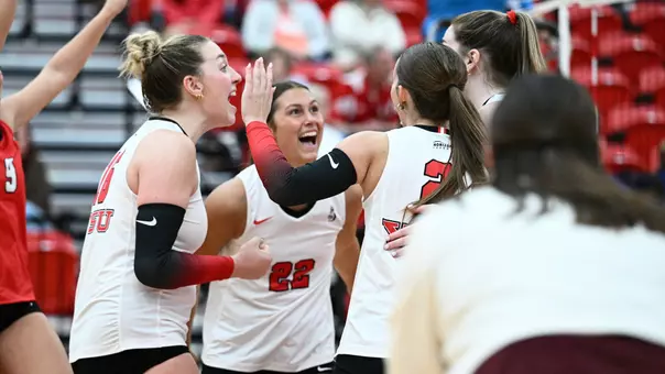 YSU's volleyball team celebrates a point in its 3-1 victory over Kent State on Sept. 18, 2026.