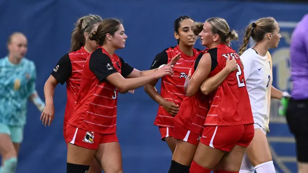 The YSU women's soccer team celebrates a goal against Pittsburgh