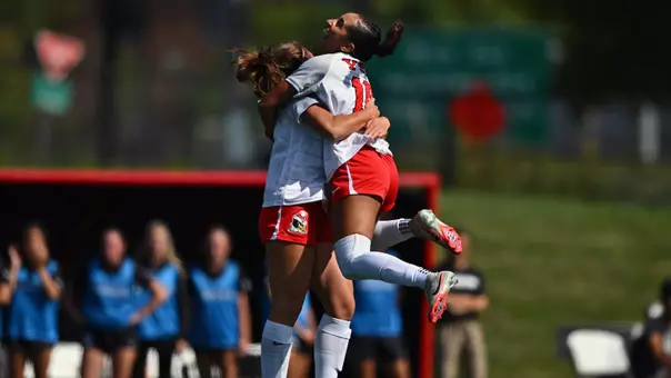 Baylee Williams and Ghita Haouzi celebrate Williams' goal against Purdue Fort Wayne