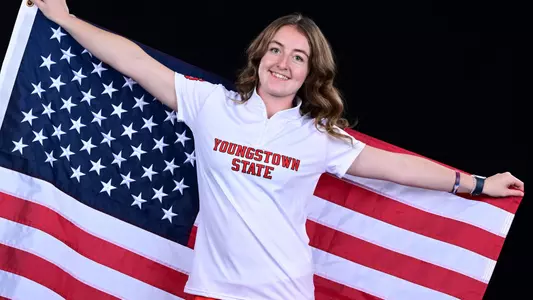 Bowler Elizabeth Teuber holds the American Flag at Youngstown State's 2026-27 media day