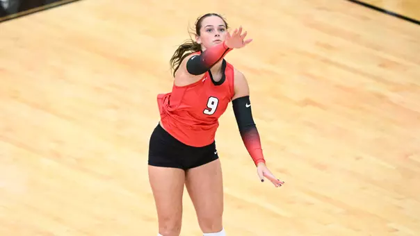 Journey Nicola serves in YSU's exhibition match against Findlay