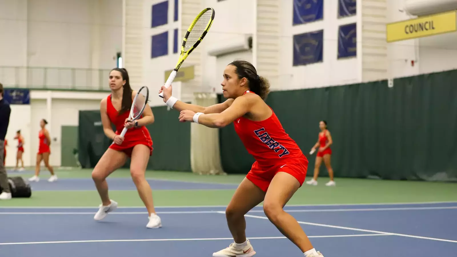 Lady Flames Persevere on the Road, Top Navy 4-2 - Liberty University