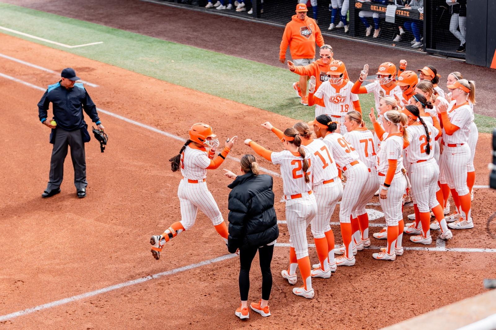 Softball Rundown Relief pitching, consistent offense power Cowgirl Softball run-rule ...