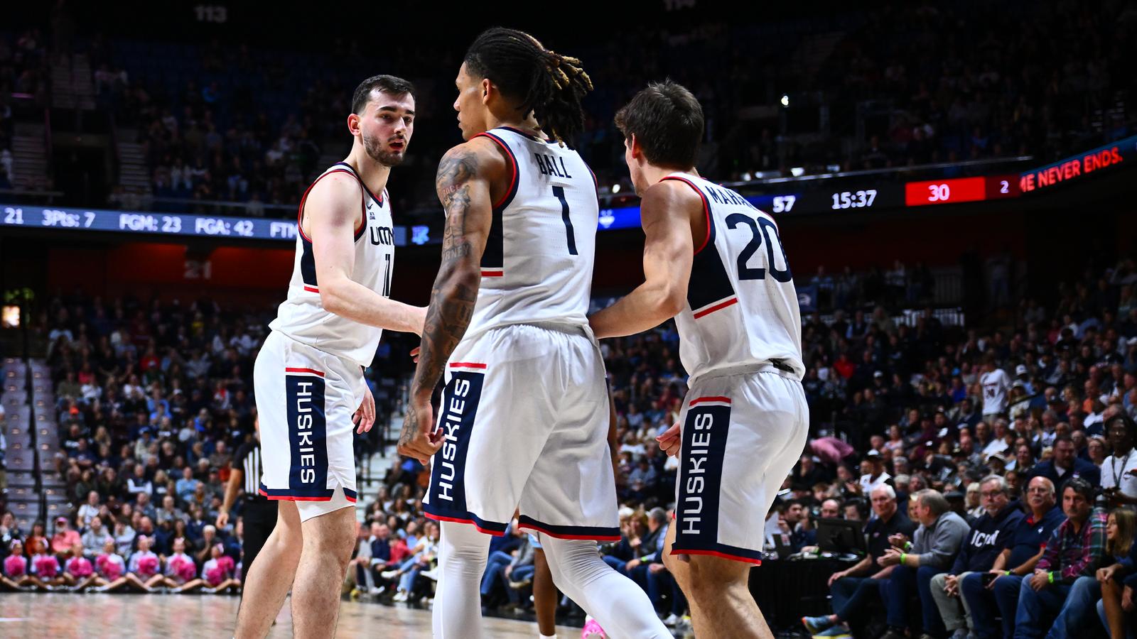 Huskies Run Past Rhody In HOF Enshrinement Game - University of ...