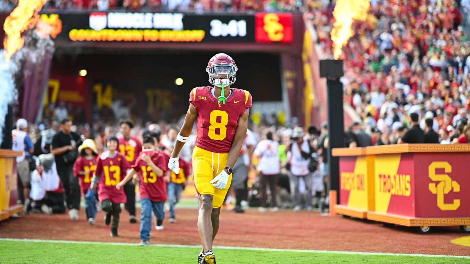 USC Trojans logo on a screen, Outlook calendar open, highlighting upcoming deadlines and important academic dates.